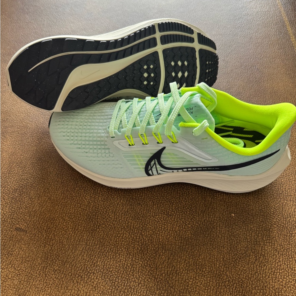 Nike Green and Black Athletic Shoes with Sleek Design